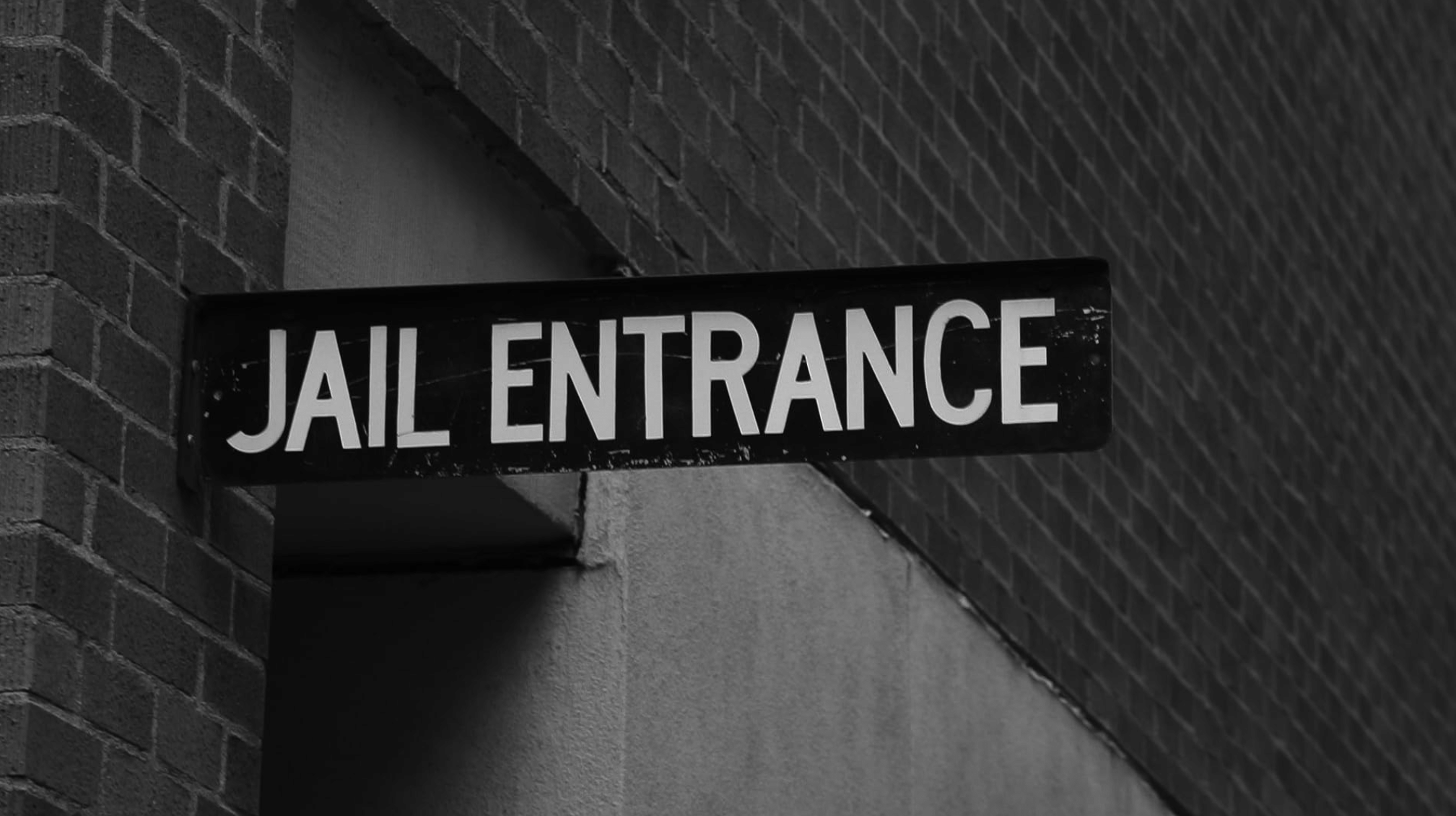 Jail entrance representing incarceration, reentry, and criminal justice storytelling
