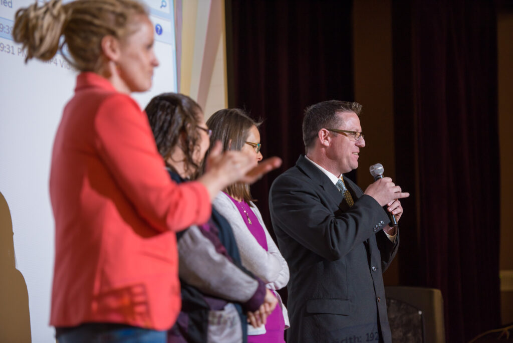 Audience attending an independent film screening and festival event
