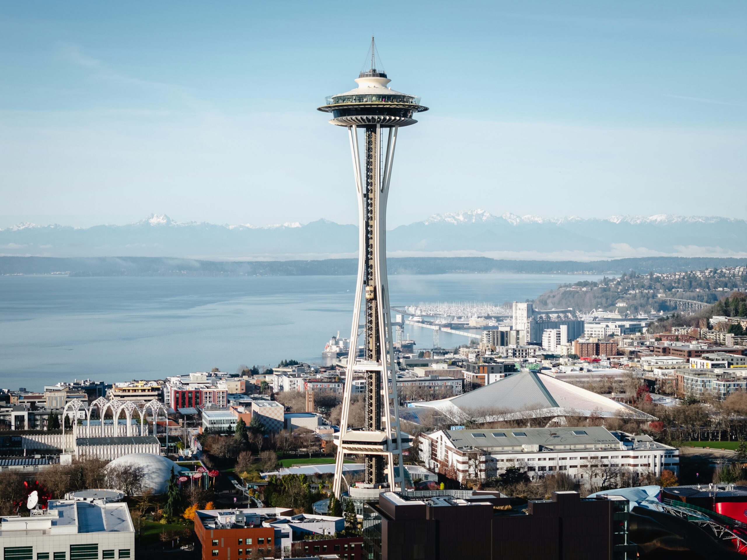 Seattle's Space Needle overlooking Elliott Bay and the Olympic Mountains