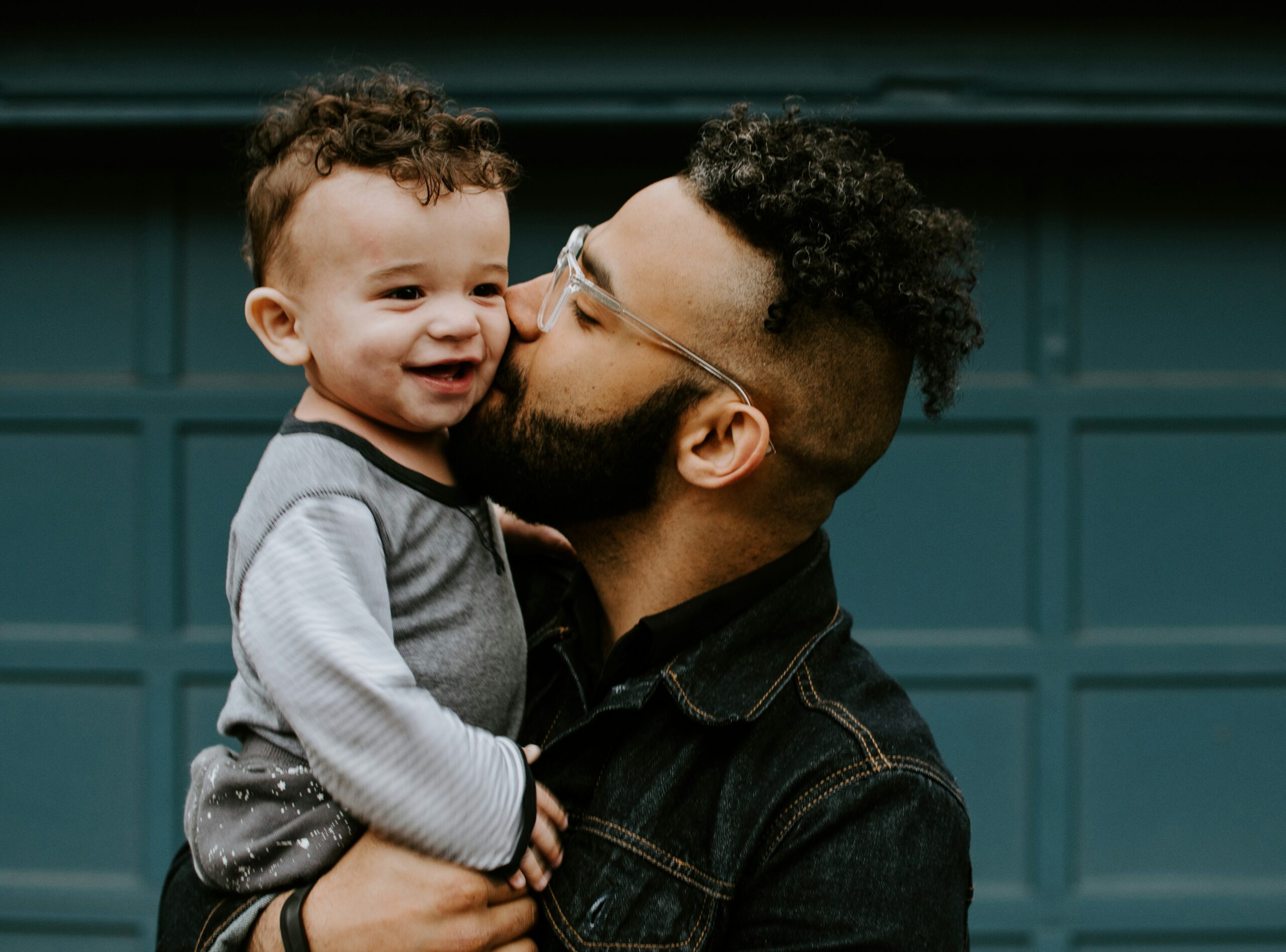 Father and son together, illustrating family connection after incarceration