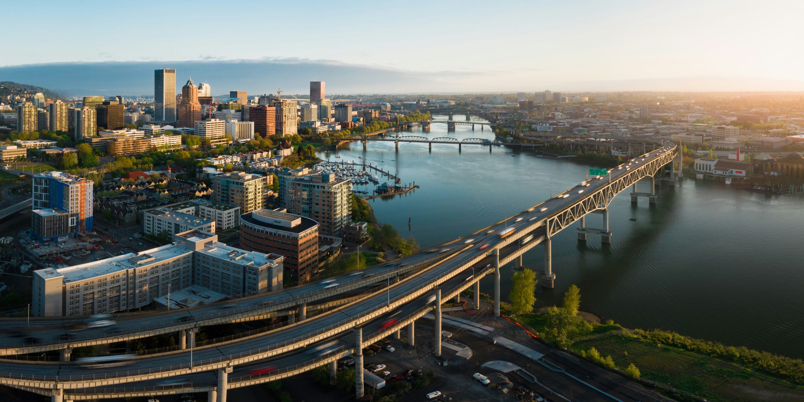 Portland skyline and bridges over the Willamette River in evening light